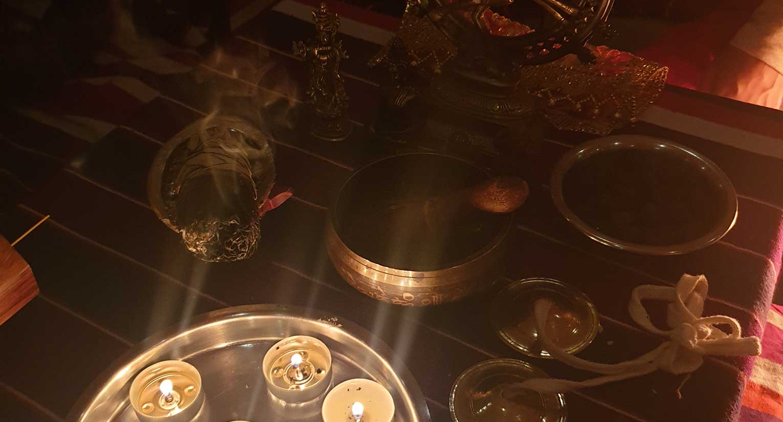 1-Our-offering_indian-statues-candles-sage