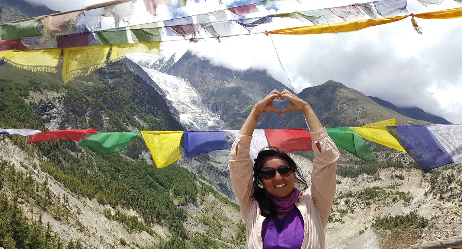 Our-offering_jasmin-heart-hands-with-tibet-flags-mountains